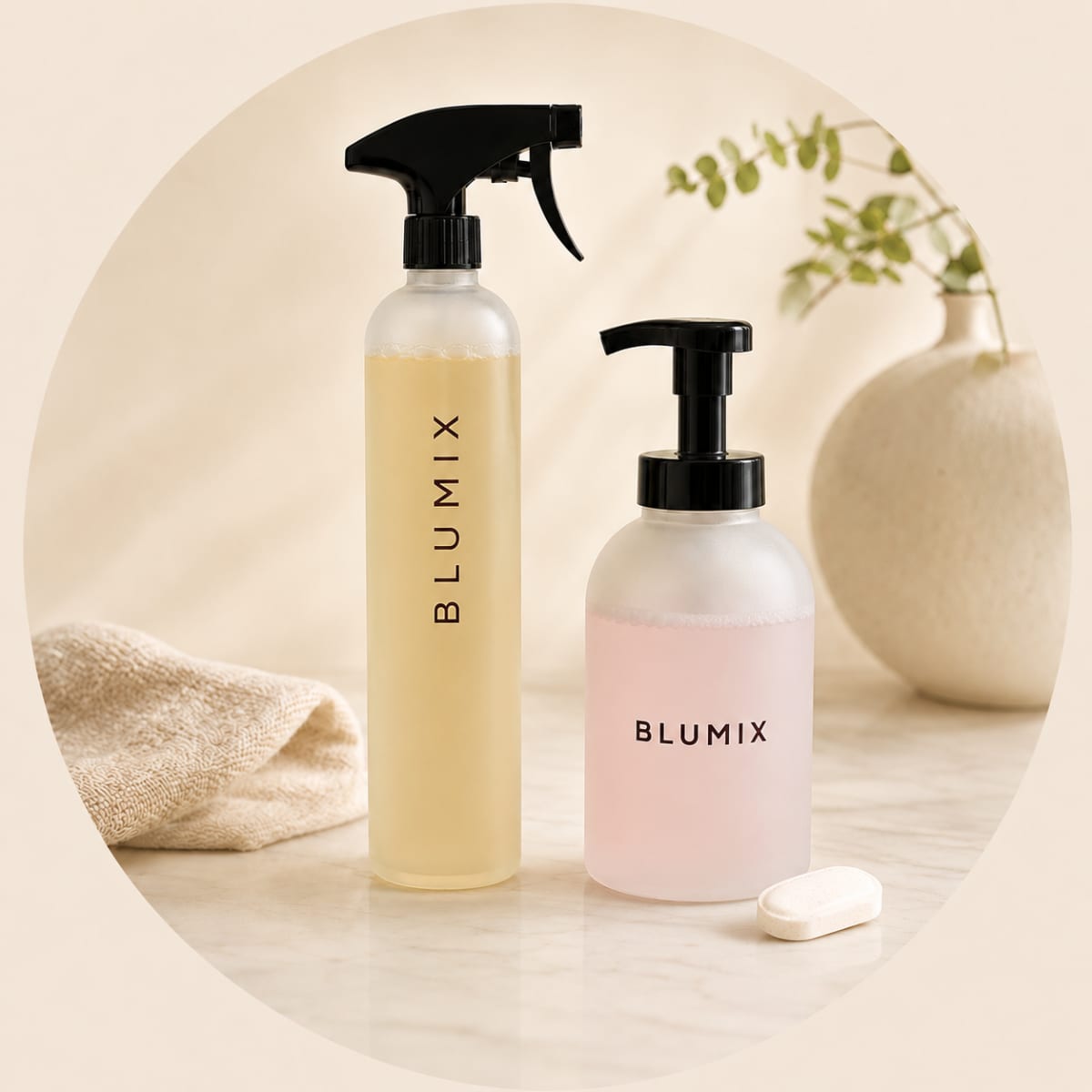 Blumix refillable multi-surface and foaming hand soap bottles with a cleaning tablet